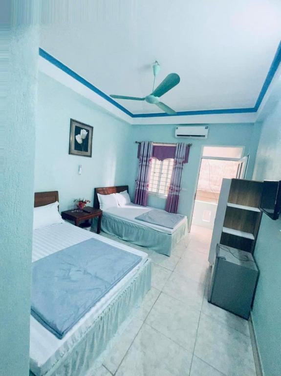 Postel nebo postele na pokoji v ubytování Phương Thủy 2 Hotel Sầm Sơn