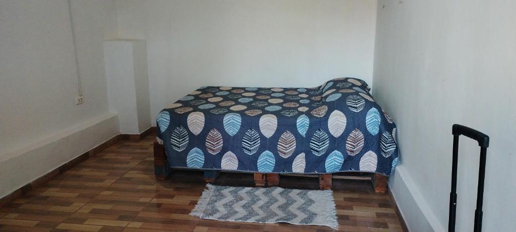 Ένα ή περισσότερα κρεβάτια σε δωμάτιο στο La Habitación de Emily
