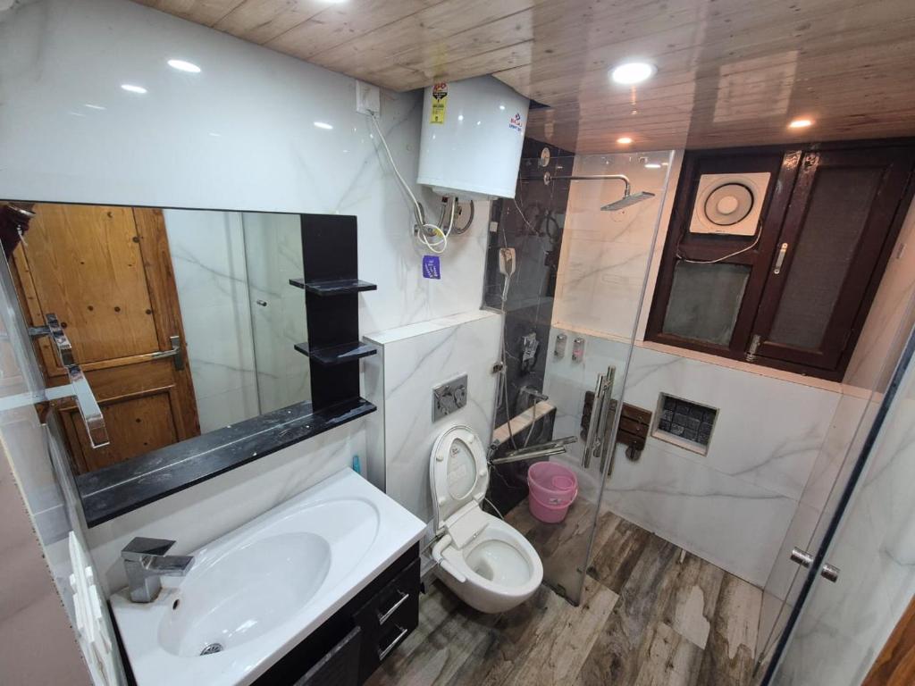 Koupelna v ubytování New Maya Home Stay