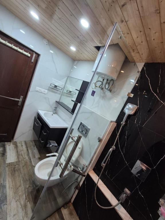 Koupelna v ubytování New Maya Home Stay