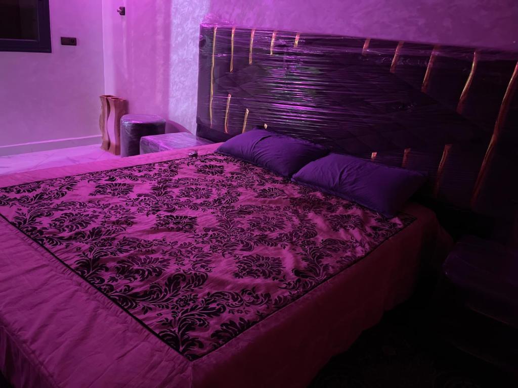 Postel nebo postele na pokoji v ubytování Khenifra