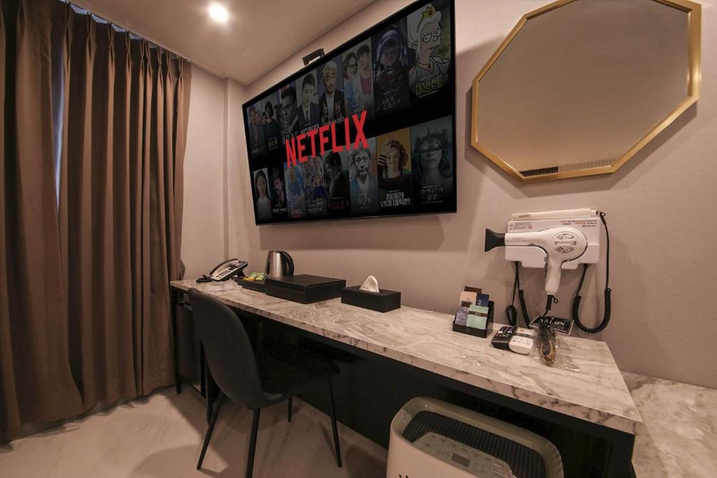 TV a/nebo společenská místnost v ubytování Hotel Sono