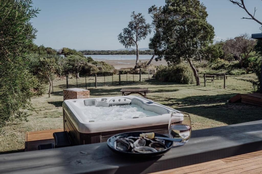 a hot tub sitting on top of a table at Sea Breeze Freycinet - Hot Tub in Coles Bay