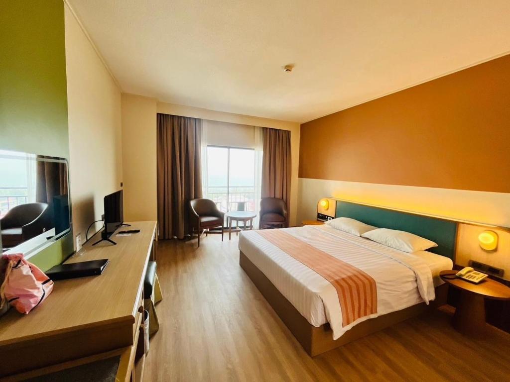 TV a/nebo společenská místnost v ubytování Asia Cha-am Hotel