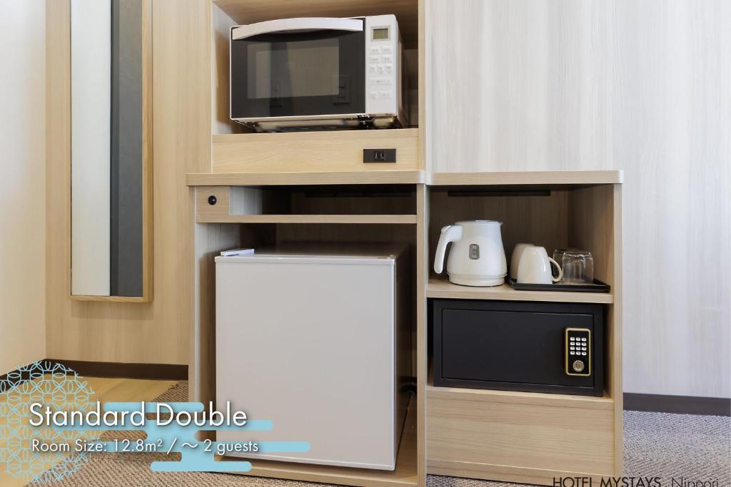 Kuchyň nebo kuchyňský kout v ubytování HOTEL MYSTAYS Nippori