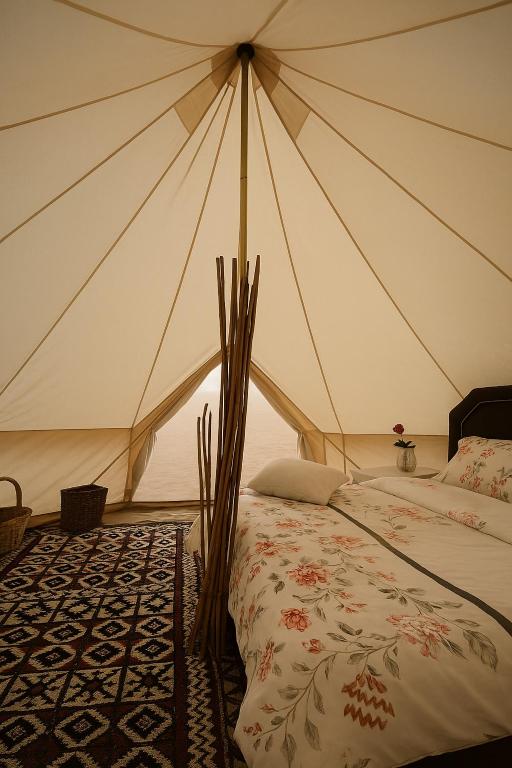 Voodi või voodid majutusasutuse Starlight privet camp toas
