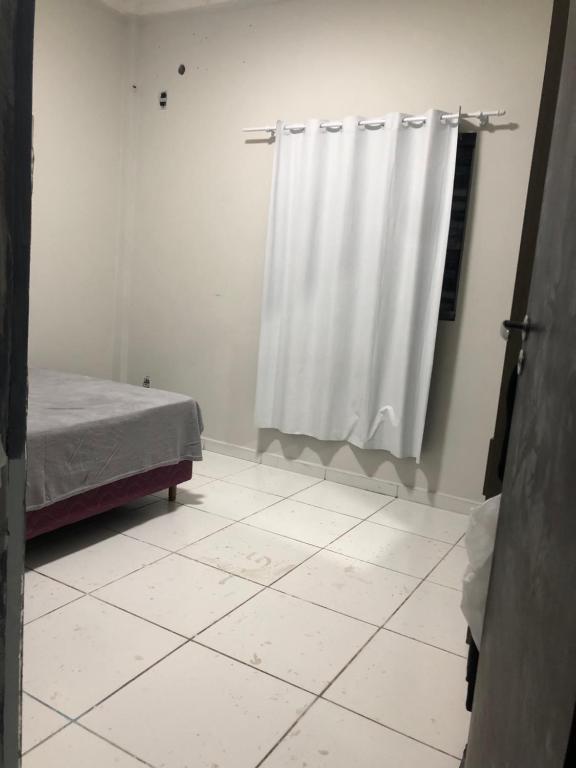 Postel nebo postele na pokoji v ubytování Apto próx de tudo com lazer e conforto
