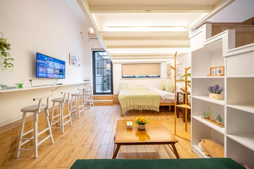 Postel nebo postele na pokoji v ubytování 柃居 B&B - IAPM Branch