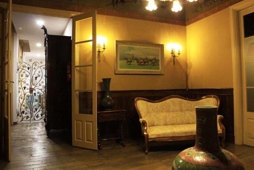 Posezení v ubytování Hostal Siglo XIX