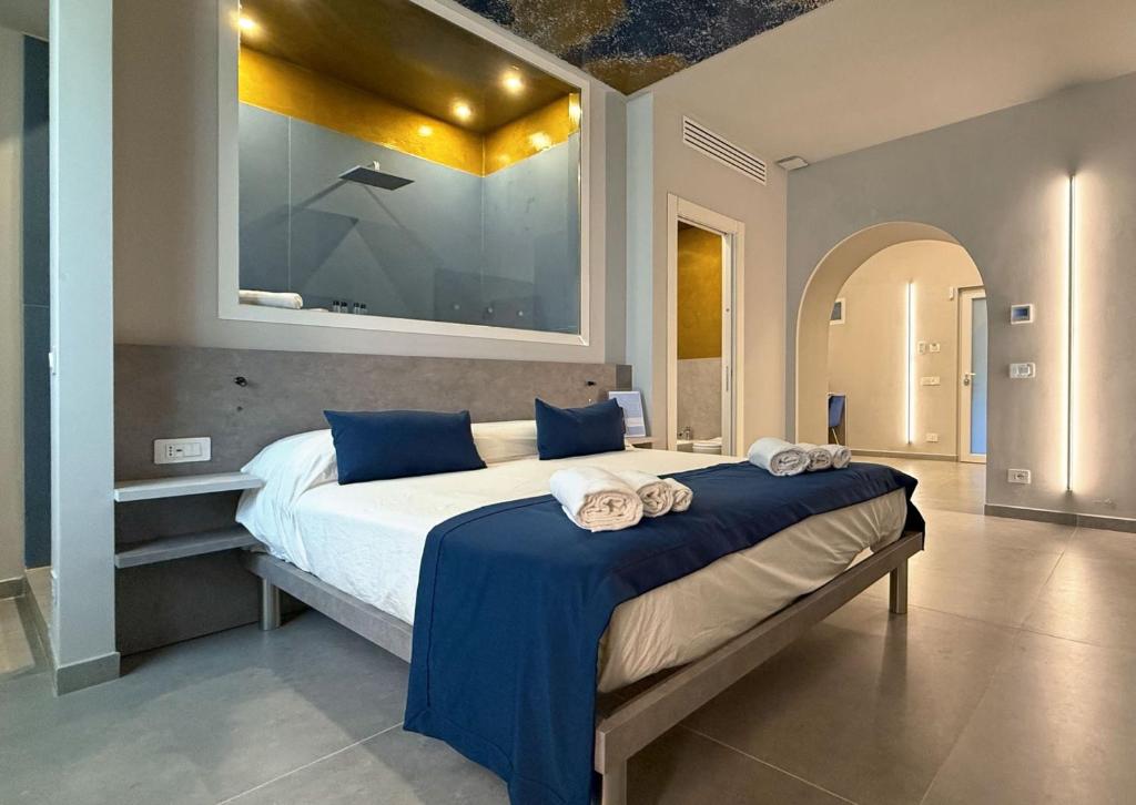 Postel nebo postele na pokoji v ubytování Shanti Rooms & Apartments Lucullo