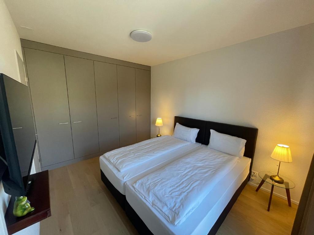 Voodi või voodid majutusasutuse Hotel Swiss Bellevue Oberwangen toas