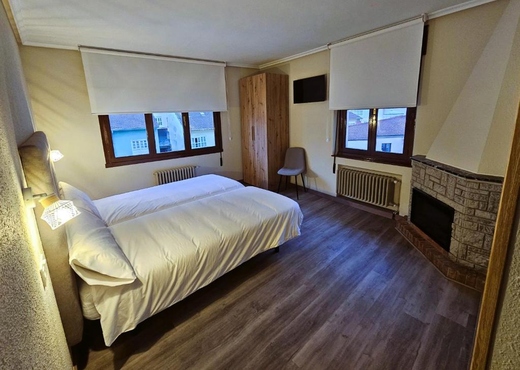 Postel nebo postele na pokoji v ubytování El Campillo