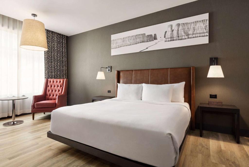 Postel nebo postele na pokoji v ubytování Origin Red Rocks, a Wyndham Hotel