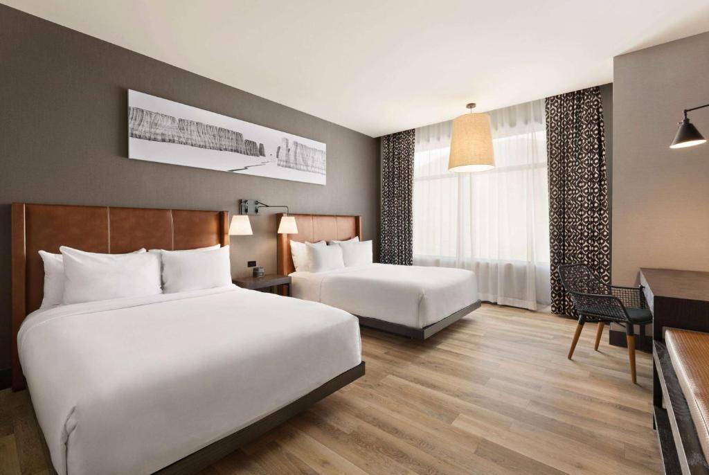 Postel nebo postele na pokoji v ubytování Origin Red Rocks, a Wyndham Hotel