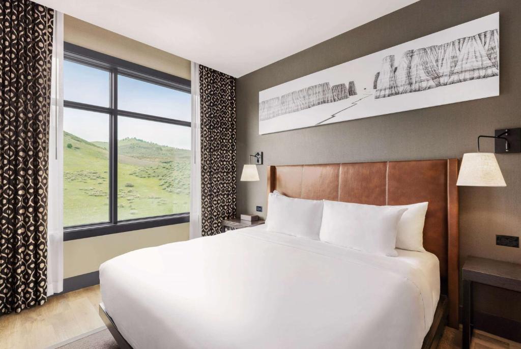 Postel nebo postele na pokoji v ubytování Origin Red Rocks, a Wyndham Hotel