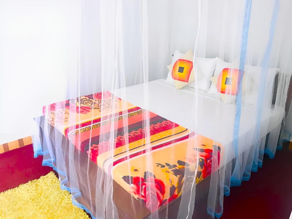 Postel nebo postele na pokoji v ubytování Senehas Homestay