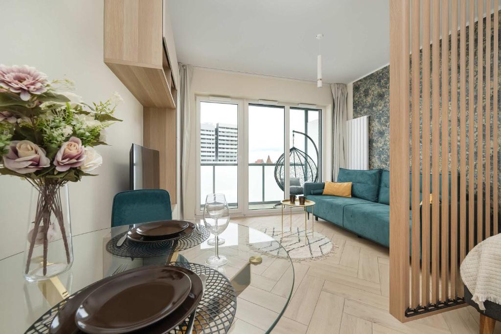 Un lugar para sentarse en Old Town River Suite with Balcony & Parking Wrocław by Noclegi Renters