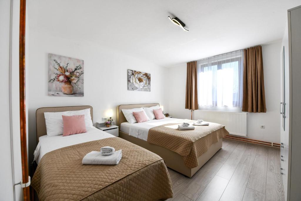 Posteľ alebo postele v izbe v ubytovaní Apartment Mlađen