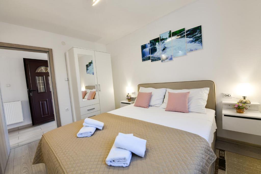 Posteľ alebo postele v izbe v ubytovaní Apartment Mlađen