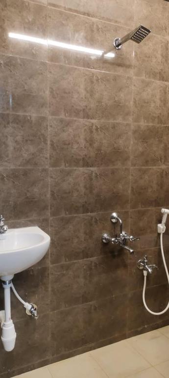 Koupelna v ubytování Nest Budget Inn