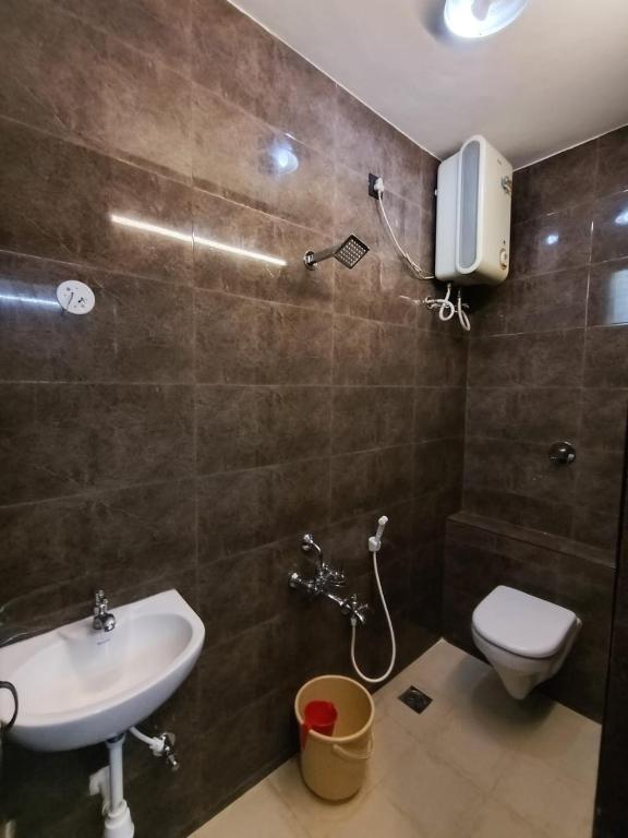 Koupelna v ubytování Nest Budget Inn