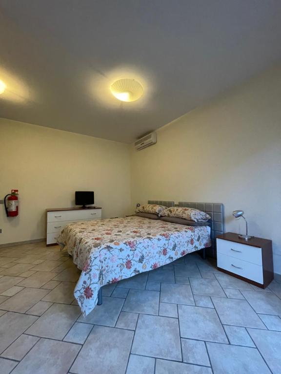 Postel nebo postele na pokoji v ubytování Studio Sole e Residenza Luna Assisi