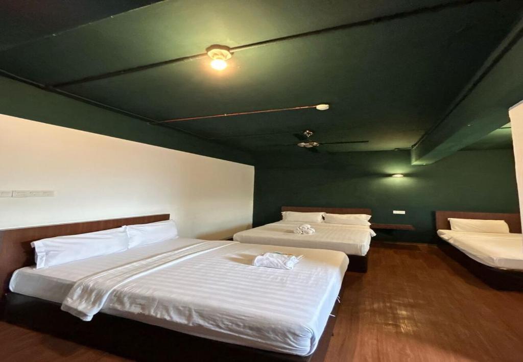 Postel nebo postele na pokoji v ubytování Room V Kluang Parade By SECOM