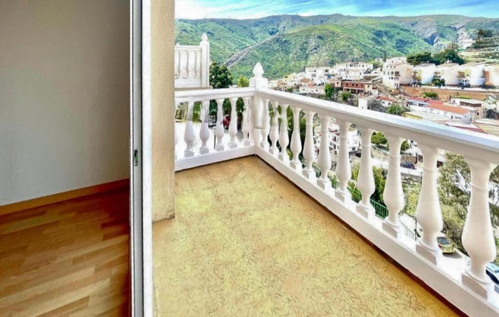 a balcony with a view of a city at Stunning Apartment In Albuñol With Wifi in Albuñol