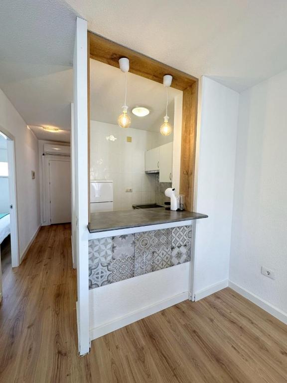 Kuchyň nebo kuchyňský kout v ubytování AH RENTALS Acualandia Apartamento