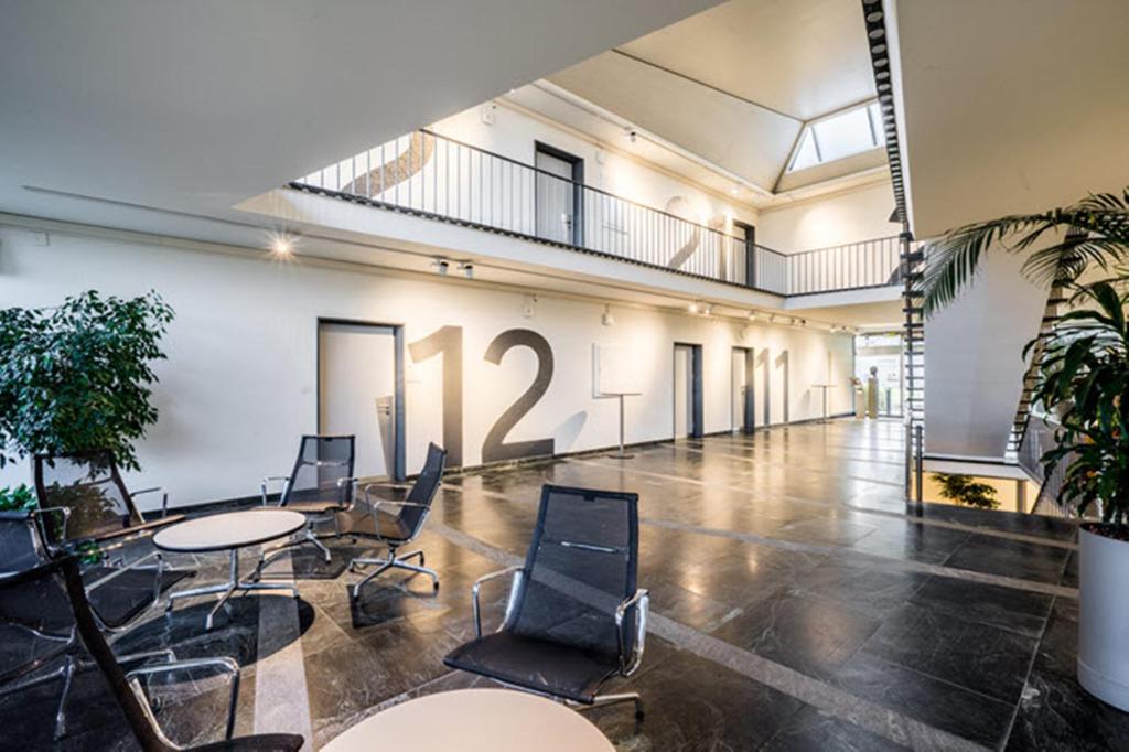 Posezení v ubytování Hotel Coop Tagungszentrum & Hotelpark im Grünen