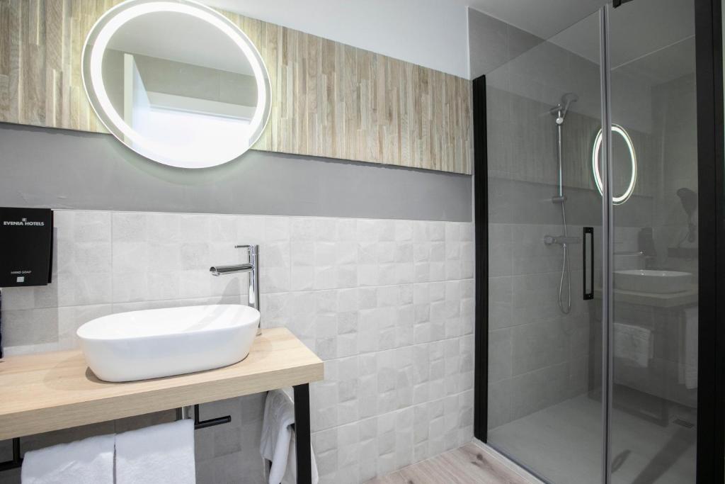 Um banheiro em Hotel Coral Boutique by gaiarooms