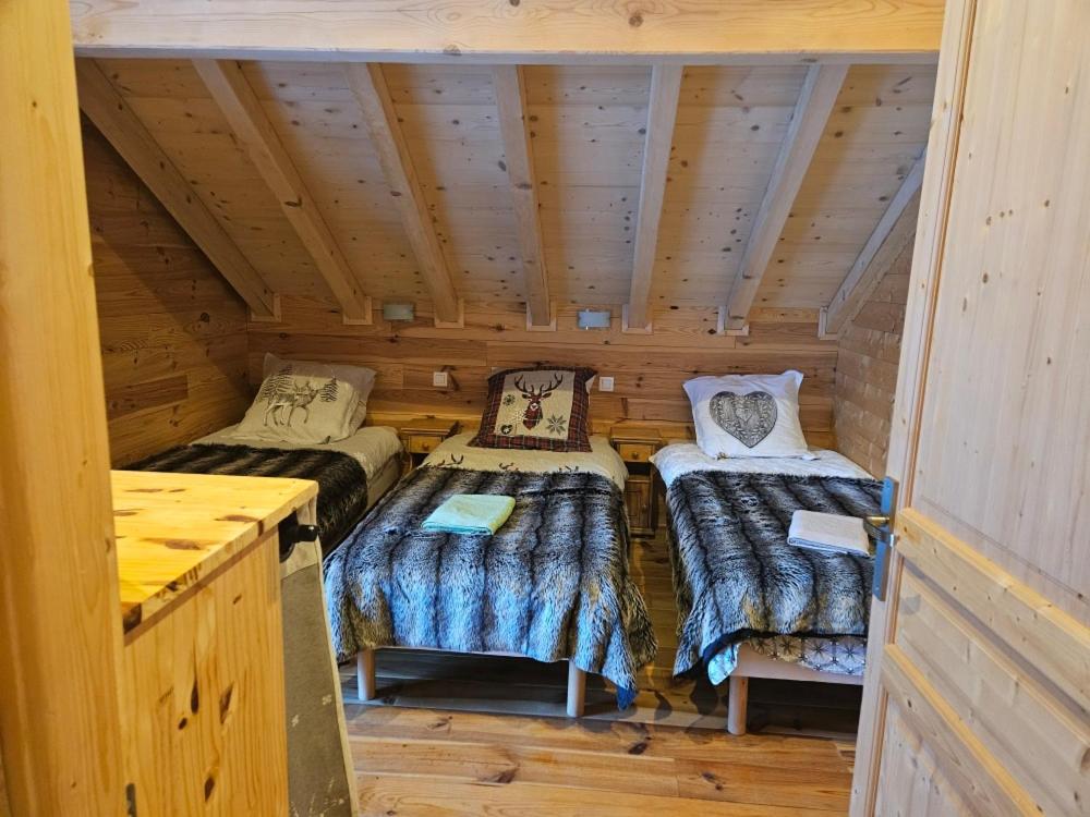 Postel nebo postele na pokoji v ubytování L'Orchidée