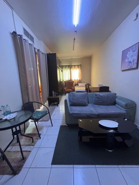 Posezení v ubytování Studio Apartment