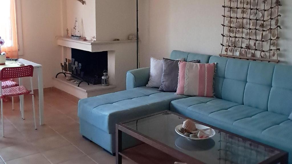 Khu vực ghế ngồi tại Kassandra Cozy Bungalow