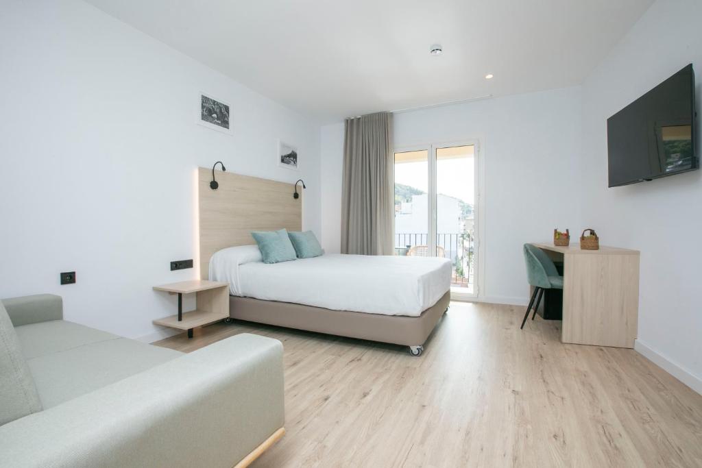 Cama ou camas em um quarto em Hotel Coral Boutique by gaiarooms