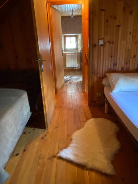 Postel nebo postele na pokoji v ubytování Gîte 6 pers jardin et cheminée à 10 mn des pistes