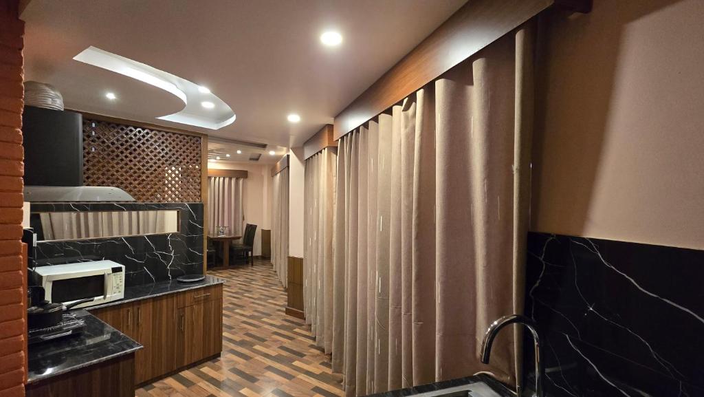Kuchyň nebo kuchyňský kout v ubytování Cosmo Homes