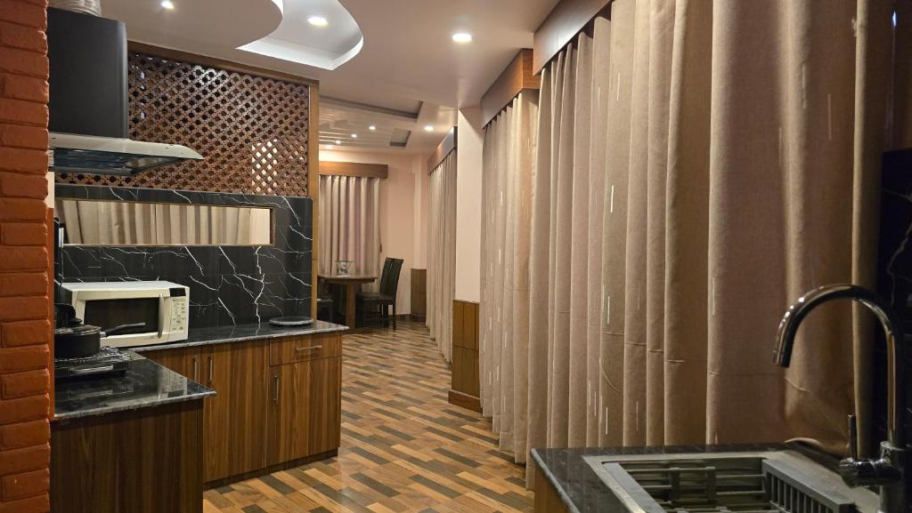 Kuchyň nebo kuchyňský kout v ubytování Cosmo Homes