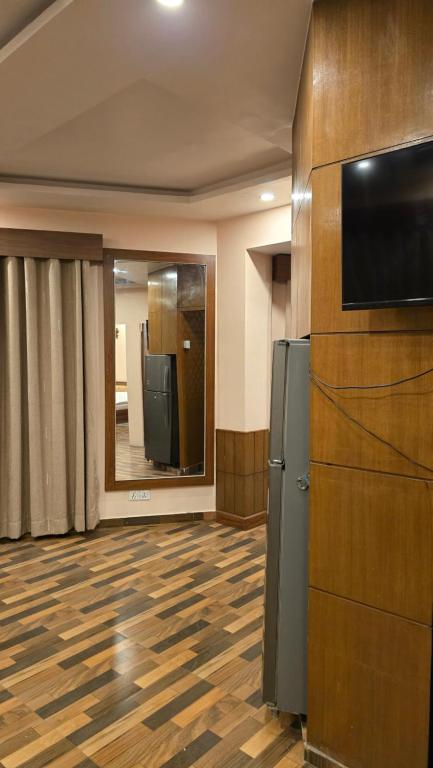 TV a/nebo společenská místnost v ubytování Cosmo Homes