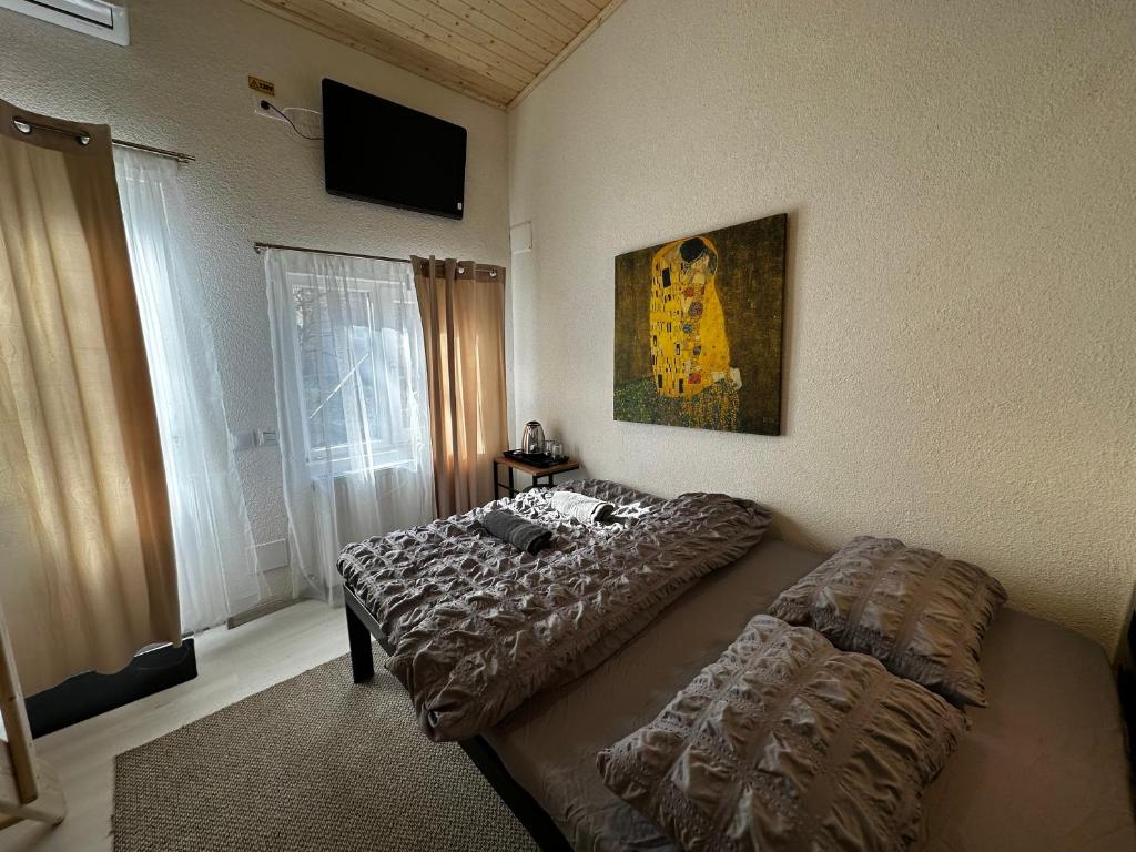 Letto o letti in una camera di Vila Ana 2 Untold