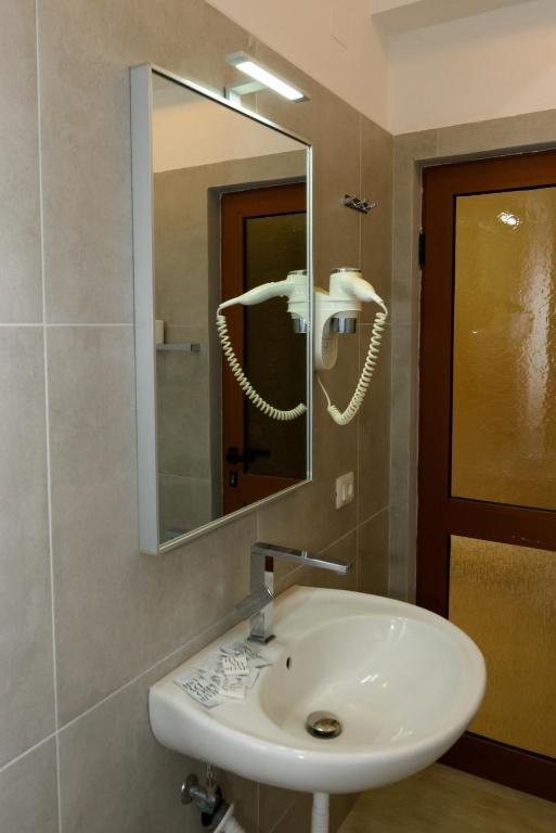 Koupelna v ubytování Hotel Nimfa