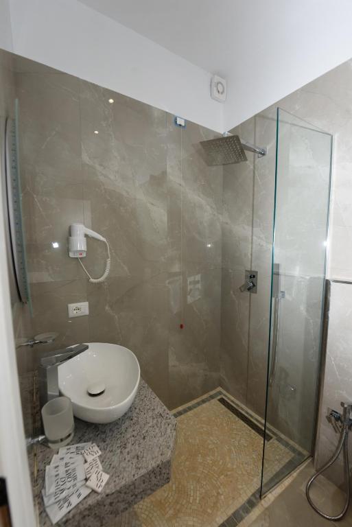 Koupelna v ubytování Hotel Nimfa