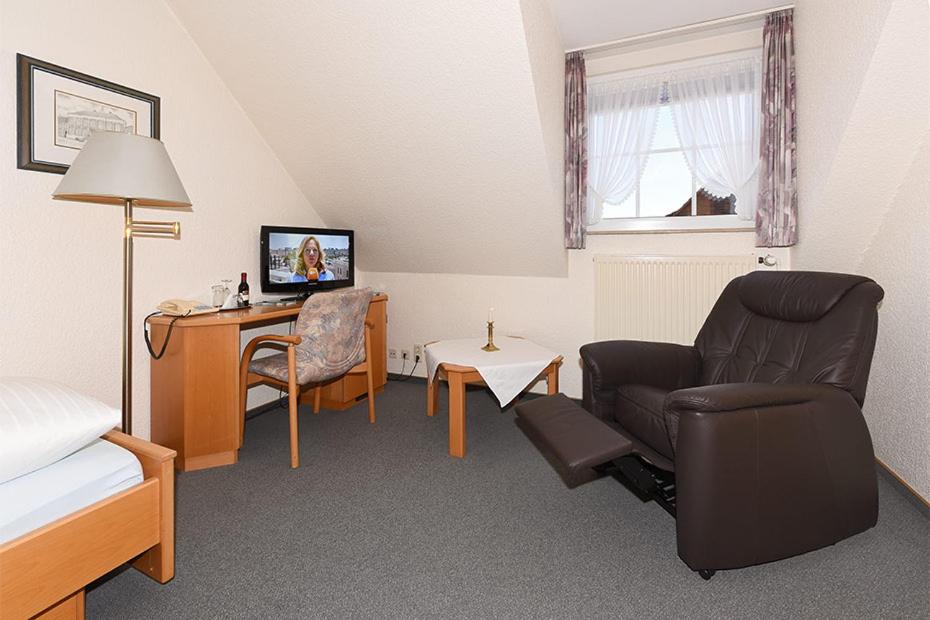 TV a/nebo společenská místnost v ubytování Hotel garni Poggenstool