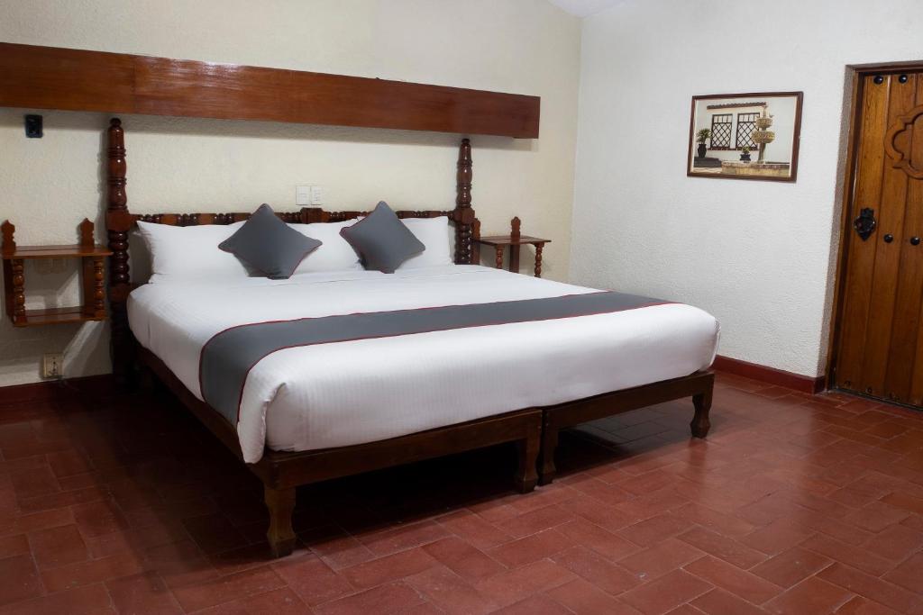 Postel nebo postele na pokoji v ubytování Collection O Hotel Mocambo, Boca del Río
