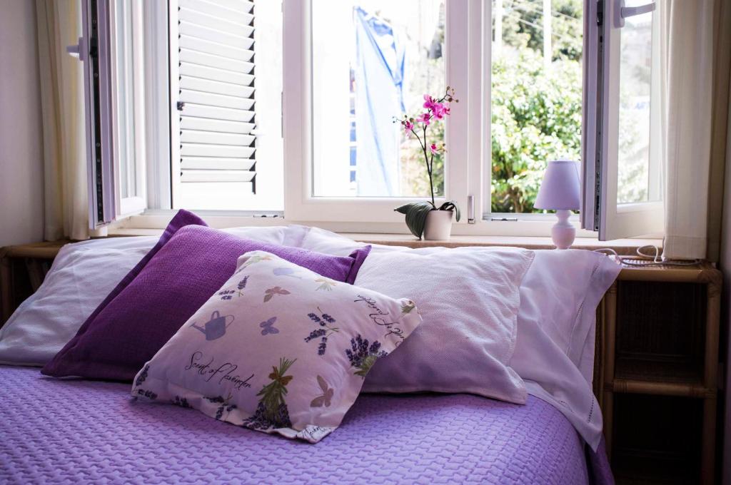 Postel nebo postele na pokoji v ubytování Villa Apollo B&B
