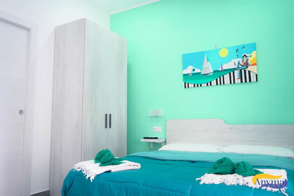 Postel nebo postele na pokoji v ubytování Anyma Home