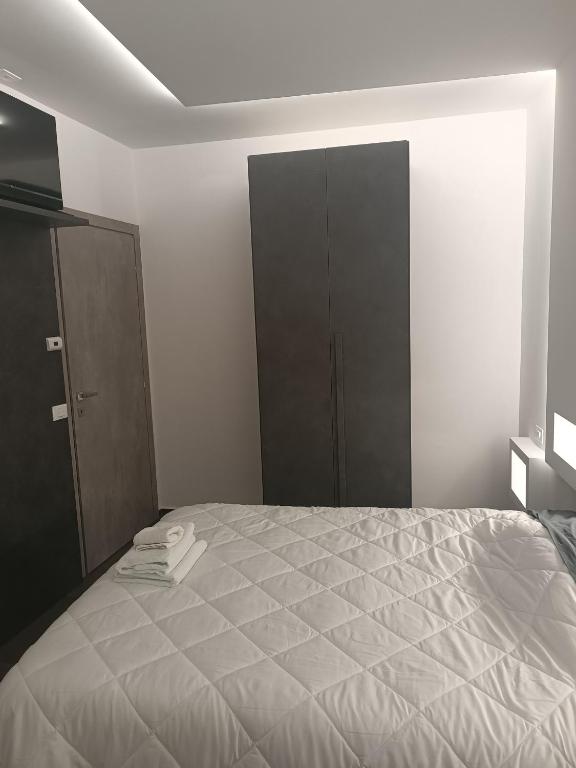 Postel nebo postele na pokoji v ubytování CIVICO 14 Holiday Rooms