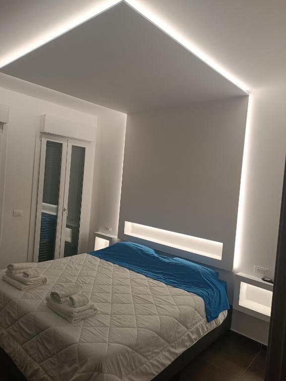 Postel nebo postele na pokoji v ubytování CIVICO 14 Holiday Rooms