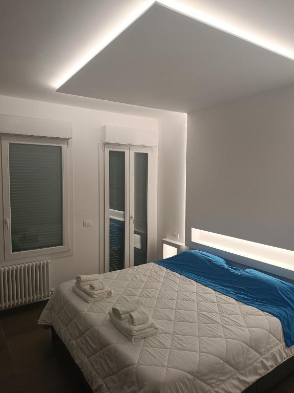 Postel nebo postele na pokoji v ubytování CIVICO 14 Holiday Rooms