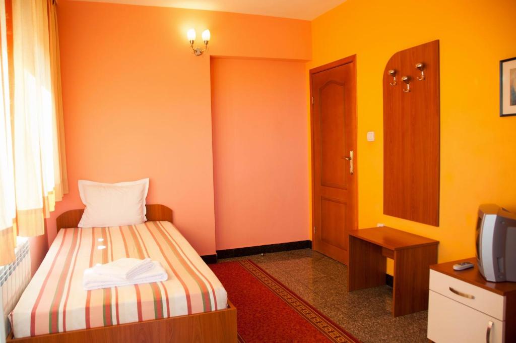 Postel nebo postele na pokoji v ubytování Hotel Ertancom